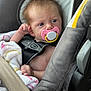 baby, pacifier, car_seat, blanket, child, infant, seatbelt, straps, closeup, face, skin, hair, hand, indoor, safety, transportation, cute, young, expression, comfort