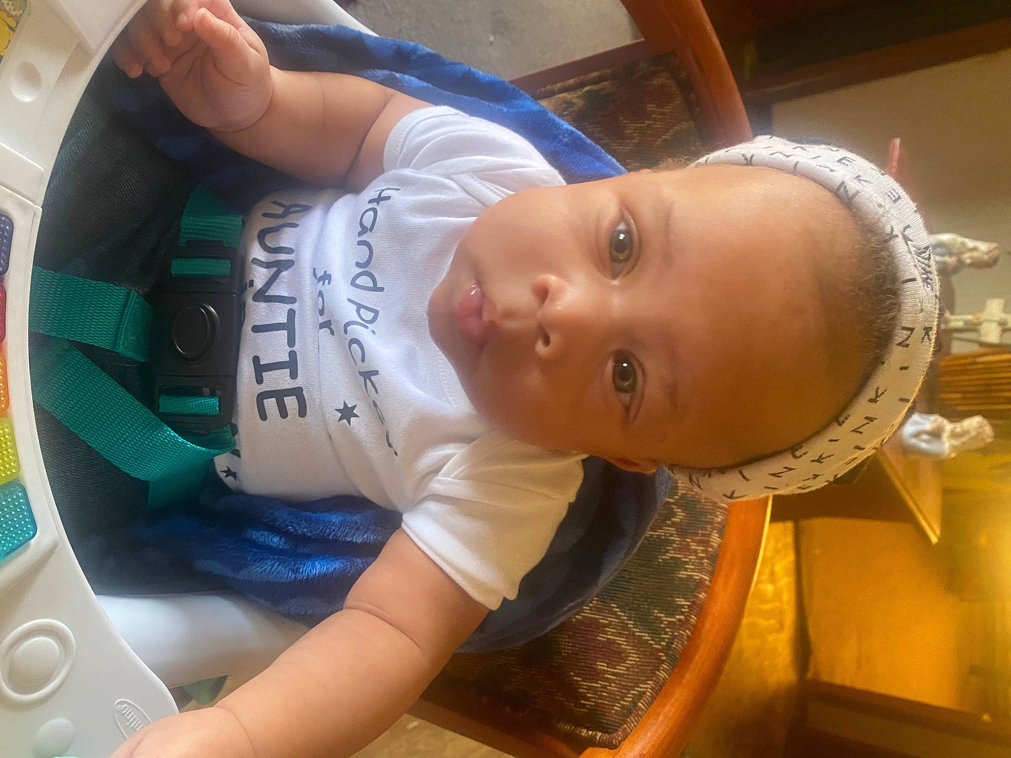 Dakarai joined the competition — help win amazing prizes! abdomen, baby, baby_products, baby_safety, baby_toddler_clothing, bathing, chair, chest, child, circle, comfort, elbow, eyelash, fun, hat, leisure, person, personal_protective_equipment, room, toddler