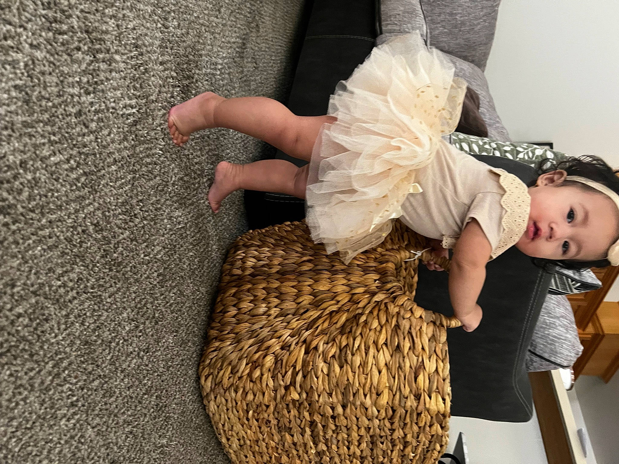 Lumi is registered to the contest to win money with this photo: broom, comfort, fashion_accessory, fashion_design, flooring, fur, human_leg, knee, long_hair, person, sandal, sitting, sock, textile, thigh, toddler, trunk, waist, wood, wool