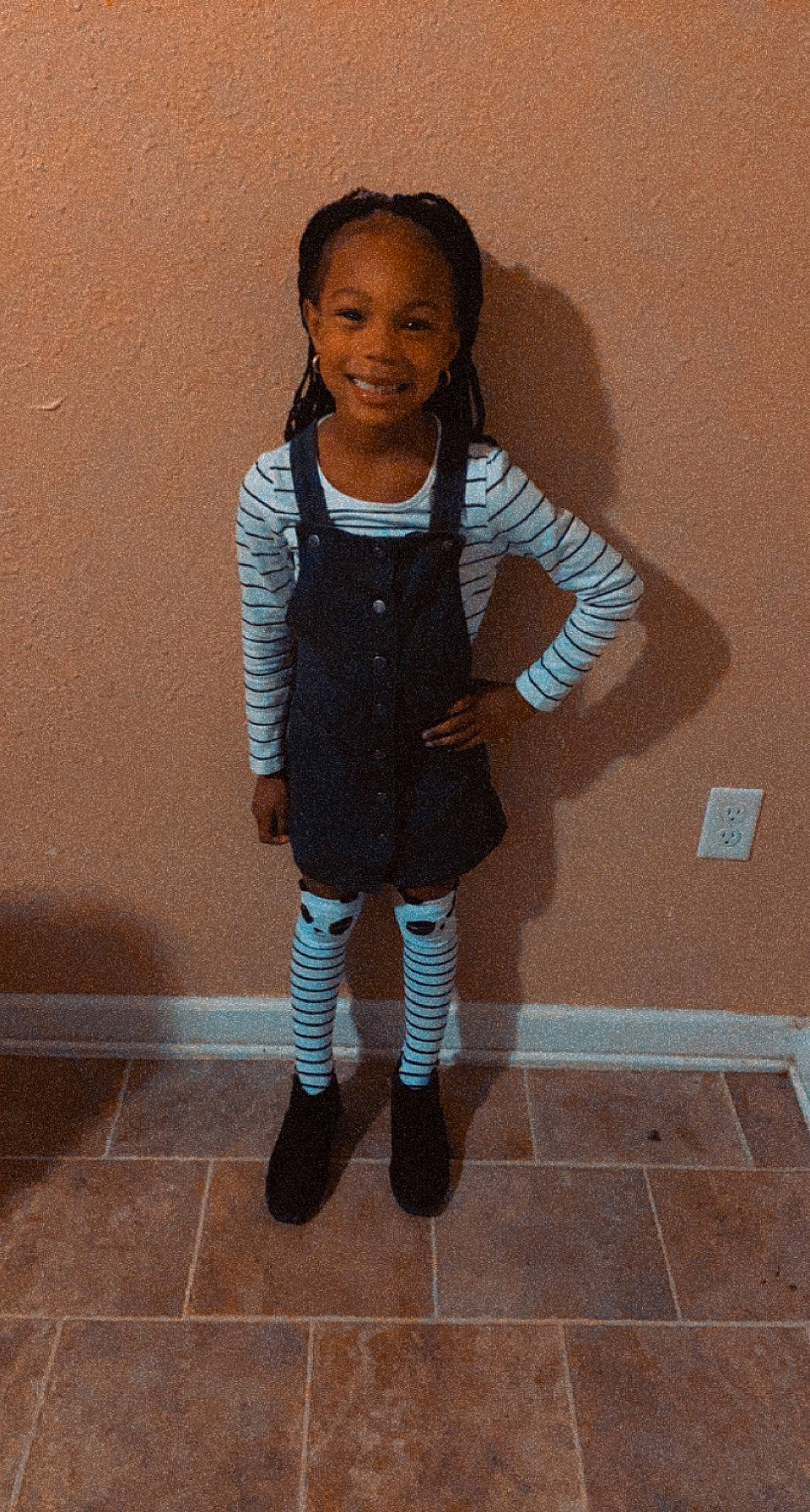 Kaeleigh is registered to the contest to win money with this photo: arm, baby_toddler_clothing, beauty, face, gesture, happy, human_body, human_leg, joy, knee, outerwear, person, school_uniform, skin, sleeve, smile, sock, standing, street_fashion, t_shirt