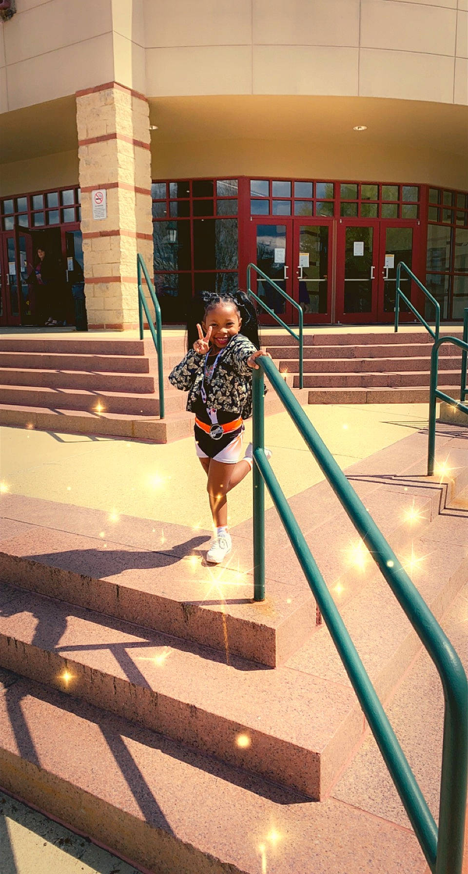 Lavonna is registered to the contest to win money with this photo: child, city, floor, flooring, fun, handrail, human_leg, joy, leisure, metal, pedestrian, person, recreation, room, running, shadow, sidewalk, stairs, thigh, tints_and_shades