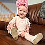 Ella joined the competition — help win amazing prizes! baby, infant, child, headband, bow, pink_clothing, onesie, bunny_applique, smile, sitting, leather_couch, shoe, sock, chubby_cheeks, portrait, indoor, shallow_depth_of_field, staircase, adorable, hands