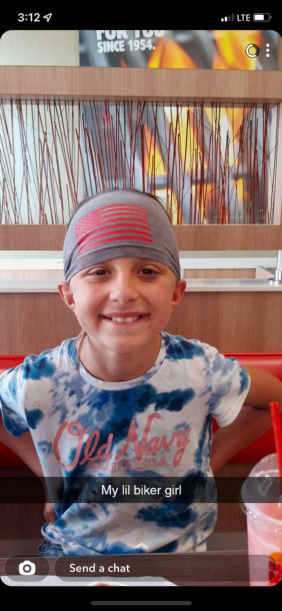 Piper Ann is registered to the contest to win money with this photo: baseball_cap, cap, chin, clothing, electric_blue, eye, fashion_accessory, forehead, fun, happy, headgear, headwear, joy, knit_cap, leisure, mouth, person, sitting, sleeve, smile