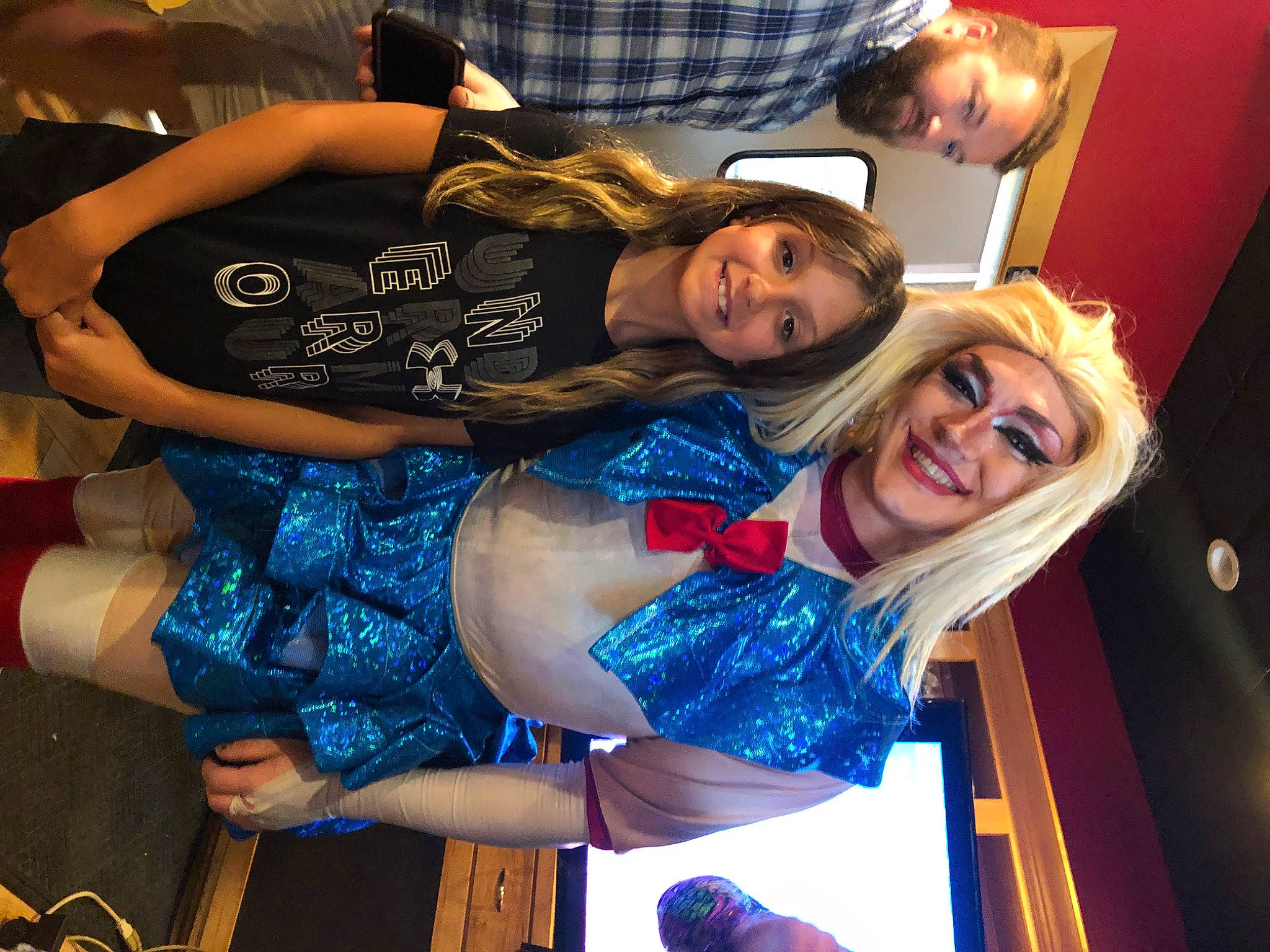 Piper Ann is registered to the contest to win money with this photo: abdomen, blue, electric_blue, event, eyewear, fashion_design, fun, happy, human_leg, joy, leisure, mouth, person, plaid, smile, tartan, thigh