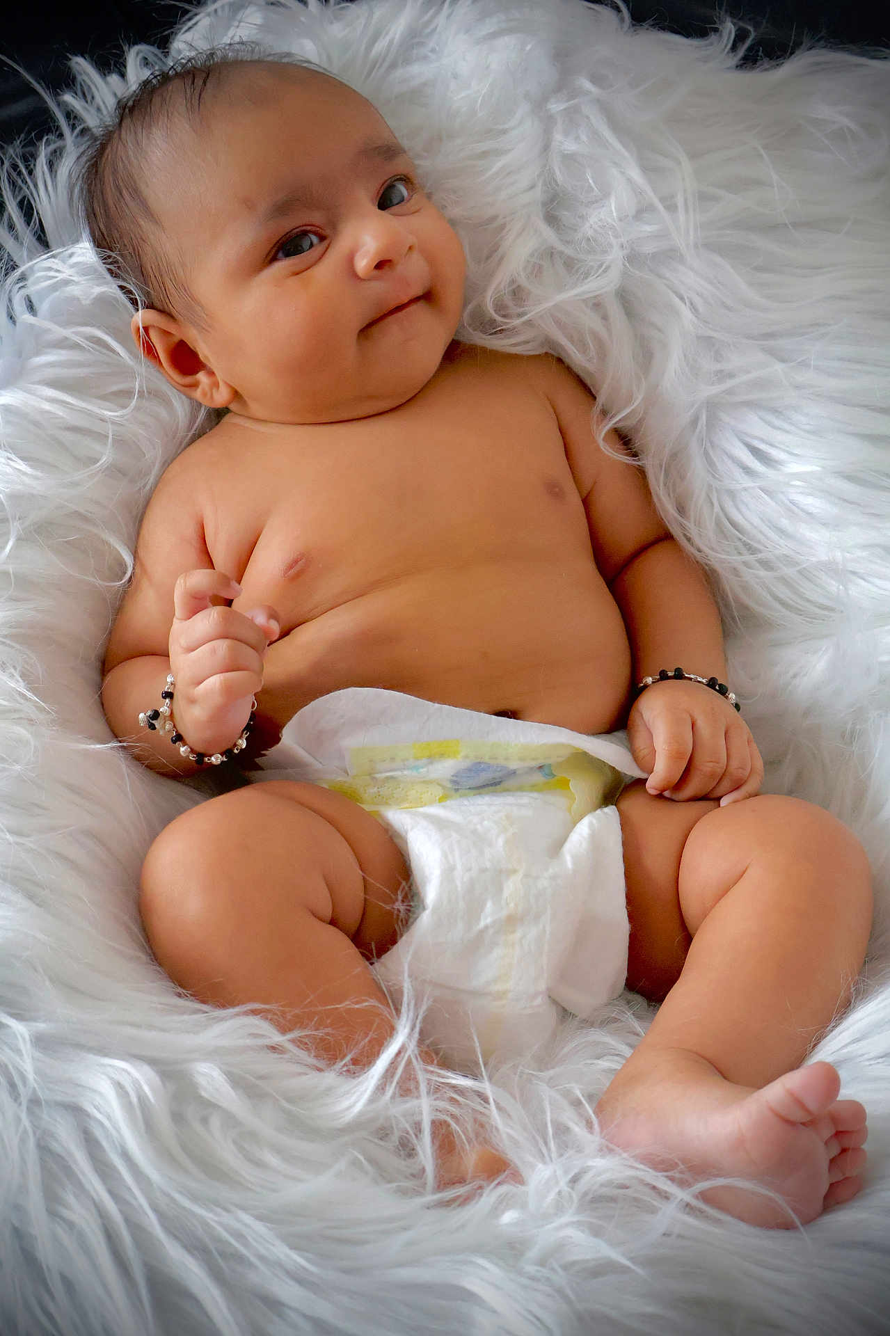 Ira joined the competition — help win amazing prizes! baby, infant, diaper, bracelet, smile, skin, cute, fluffy_blanket, relaxing, chubby, child, portrait, human, fingertips, toes, soft_texture, comfort, happy, naked_torso, newborn