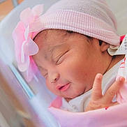 Camila joined the competition — help win amazing prizes! newborn, baby, sleeping, pink, hat, flower, blanket, crib, infant, peaceful, cute, closeup, portrait, soft, cozy, resting, child, indoors, toddler, person