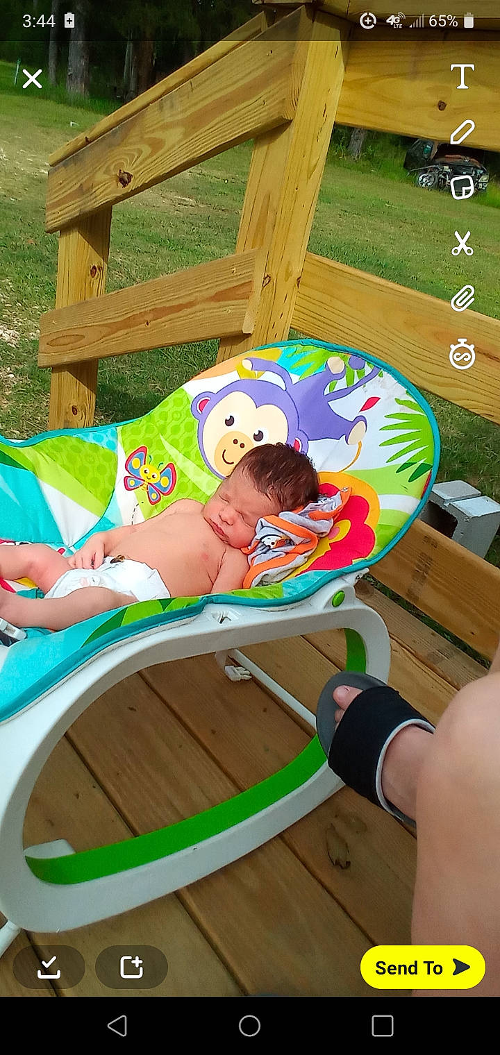 Jamison joined the competition — help win amazing prizes! baby_playing_with_toys, baby_products, baby_toddler_clothing, baby_toys, child, comfort, fun, grass, green, happy, leisure, outdoor_furniture, person, play, recreation, thigh, toddler, toy, vacation, wood