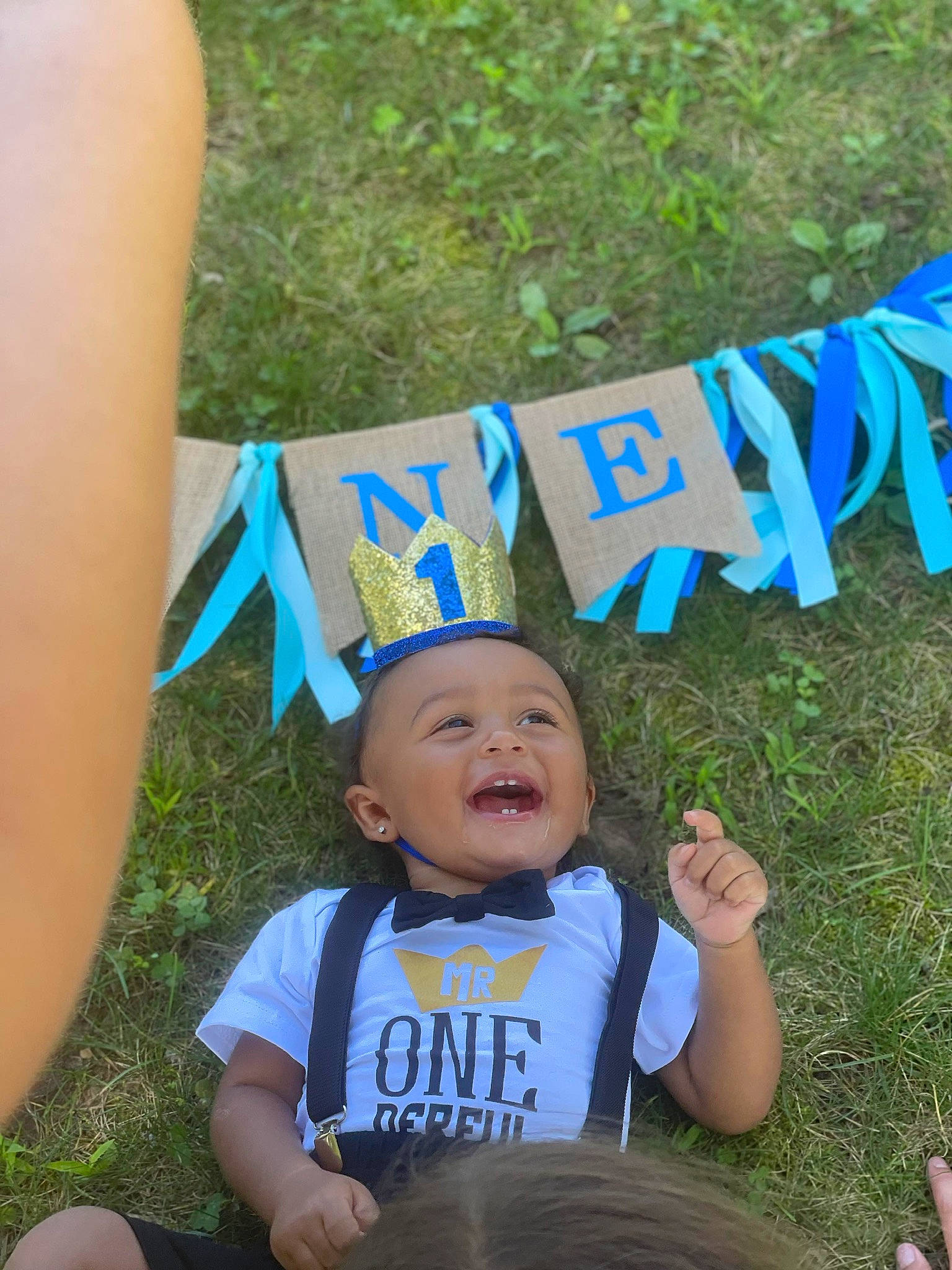 Legend is registered to the contest to win money with this photo: baby, baby_toddler_clothing, child, electric_blue, event, fun, grass, happy, hat, lawn, leaf, leisure, people_in_nature, person, plant, recreation, smile, summer, t_shirt, toddler