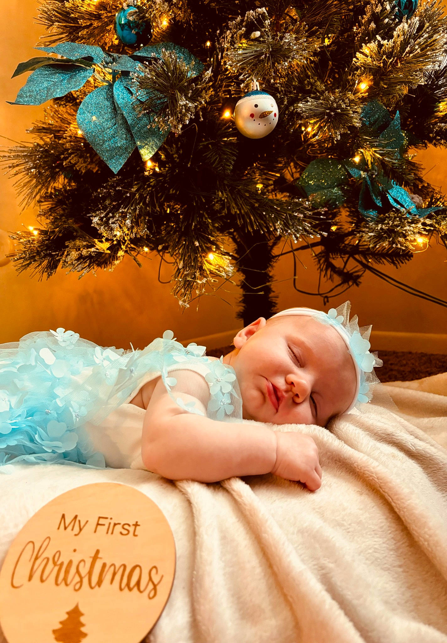 Gemma is registered to the contest to win money with this photo: baby, baby_toddler_clothing, beauty, child, christmas, christmas_decoration, christmas_eve, christmas_ornament, christmas_tree, comfort, event, evergreen, happy, holiday, holiday_ornament, ornament, people_in_nature, person, plant, toddler