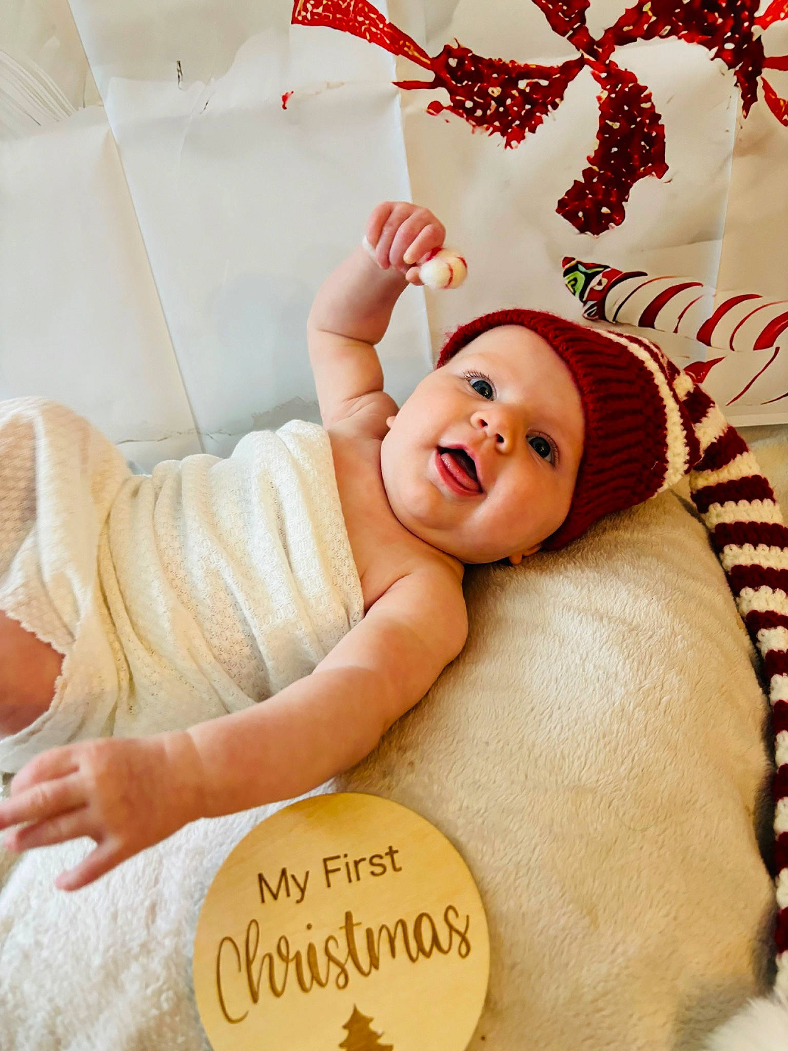 Gemma is registered to the contest to win money with this photo: baby, baby_sleeping, baby_toddler_clothing, child, comfort, font, foot, gesture, happy, headwear, human_body, human_leg, linens, peach, person, pink, room, skin, smile, thigh