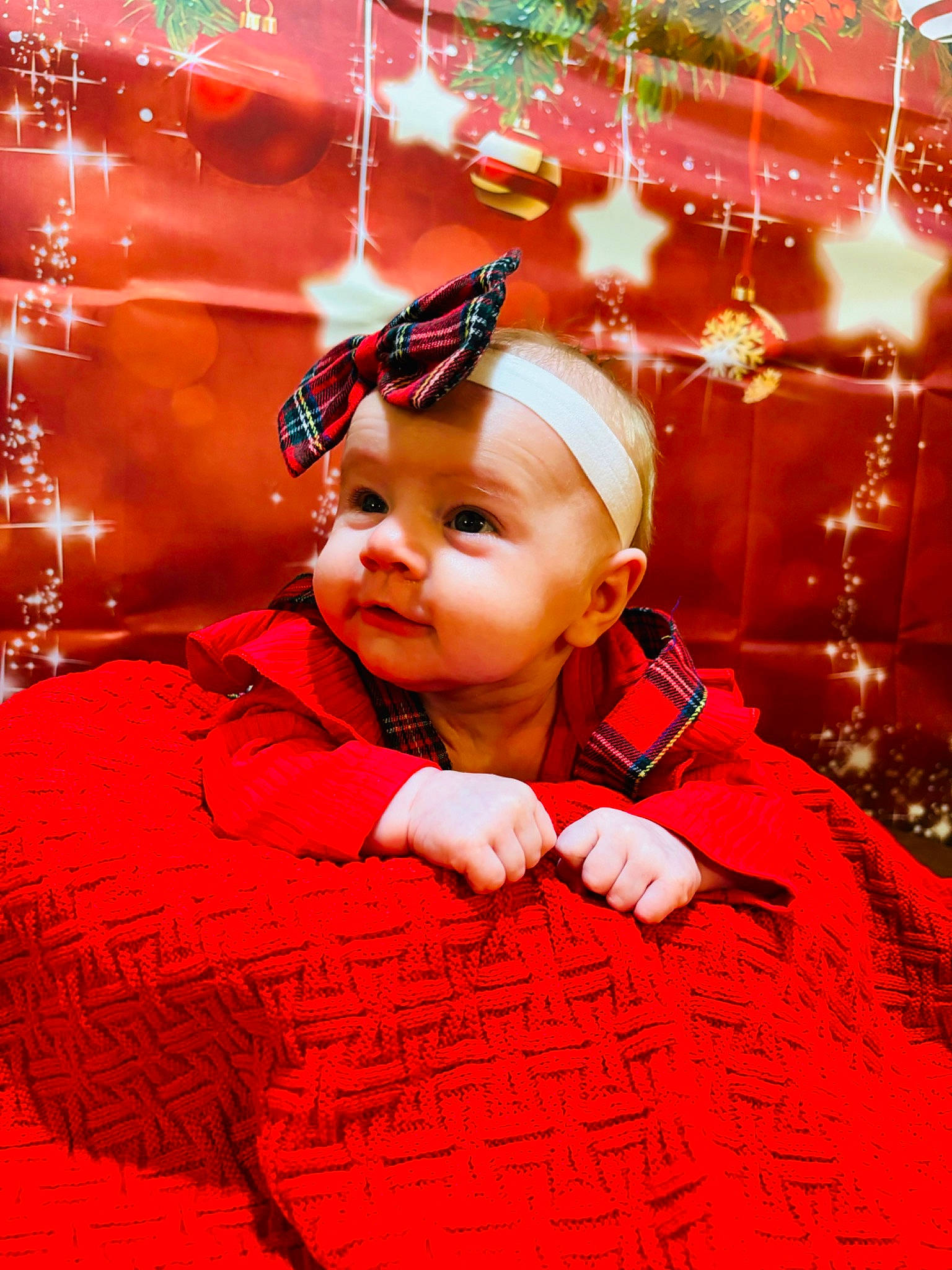 Gemma is registered to the contest to win money with this photo: baby, baby_toddler_clothing, child, christmas, christmas_decoration, christmas_eve, christmas_ornament, decoration, event, facial_expression, flash_photography, fun, happy, headwear, holiday, magenta, ornament, person, red, sleeve