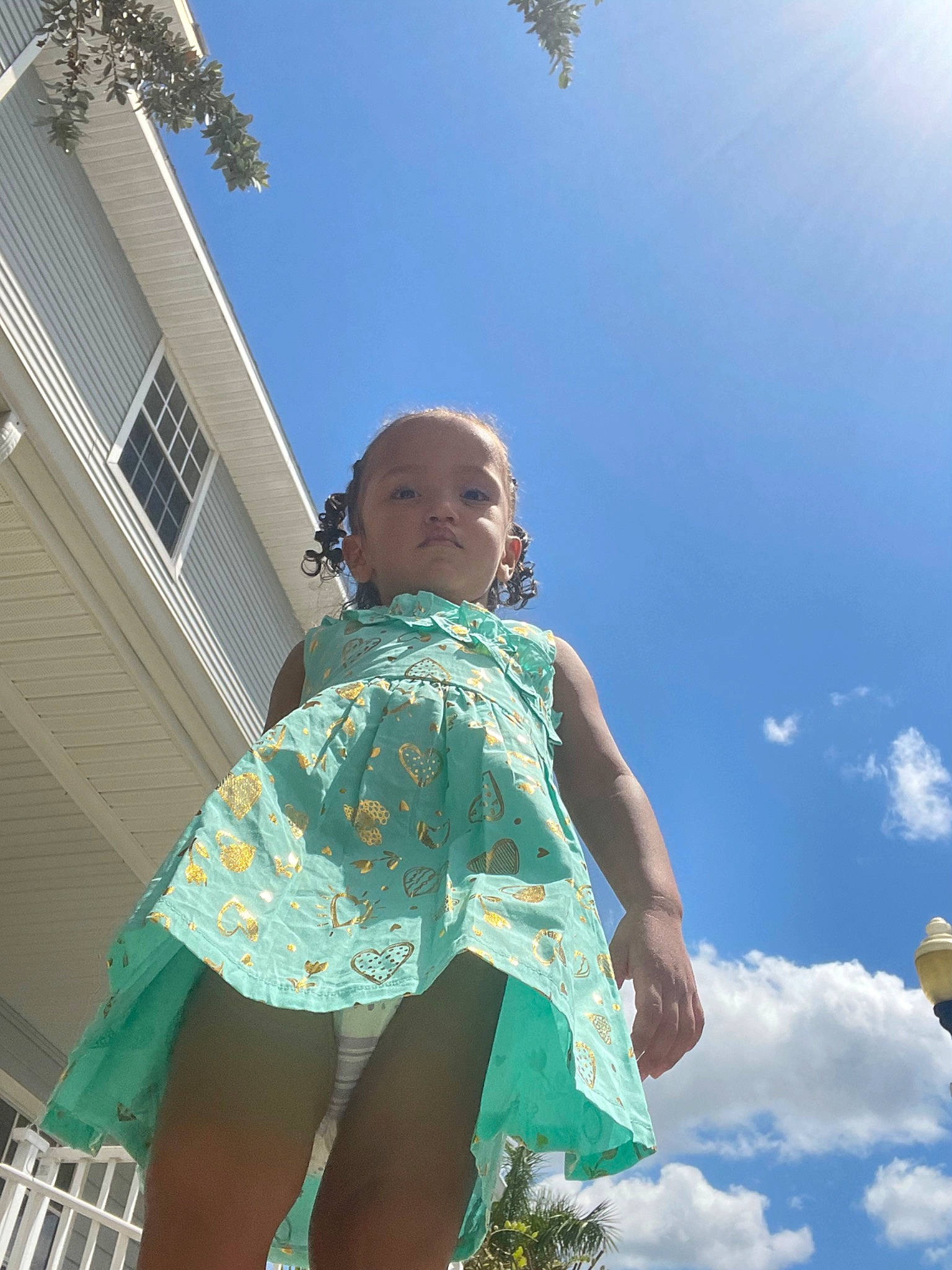 Irianny is registered to the contest to win money with this photo: azure, blue, child, cloud, cumulus, electric_blue, fun, grass, happy, house, human_leg, leisure, people_in_nature, person, shoulder, sky, sunlight, tints_and_shades, toddler, travel
