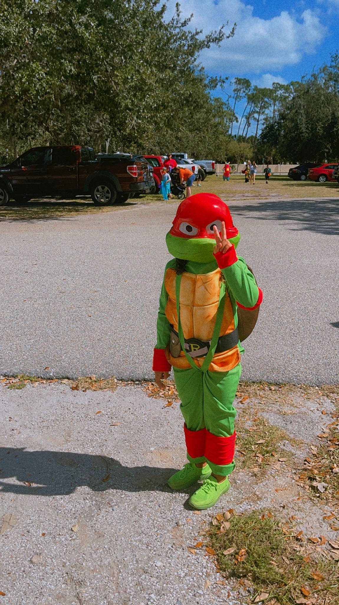 Irianny joined the competition — help win amazing prizes! asphalt, car, cloud, costume_hat, event, fictional_character, fun, grass, hat, holiday, lawn_ornament, mascot, person, personal_protective_equipment, plant, road_surface, sky, stuffed_toy, toy, tree