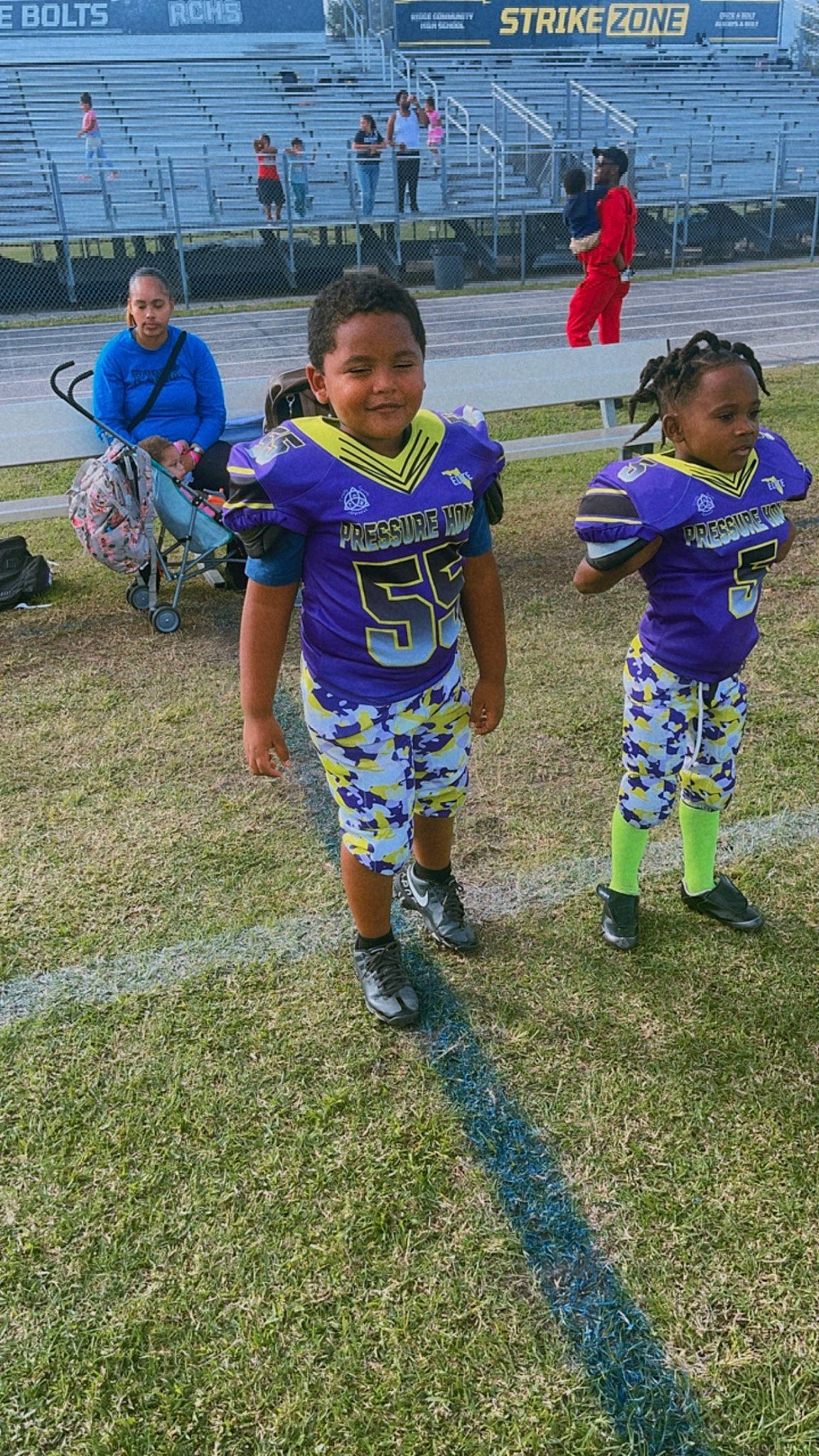 Jayko is registered to the contest to win money with this photo: chair, child, competition_event, event, football, fun, grass, leisure, person, play, player, recreation, shoe, shorts, sneakers, sports, t_shirt, team, team_sport, toddler