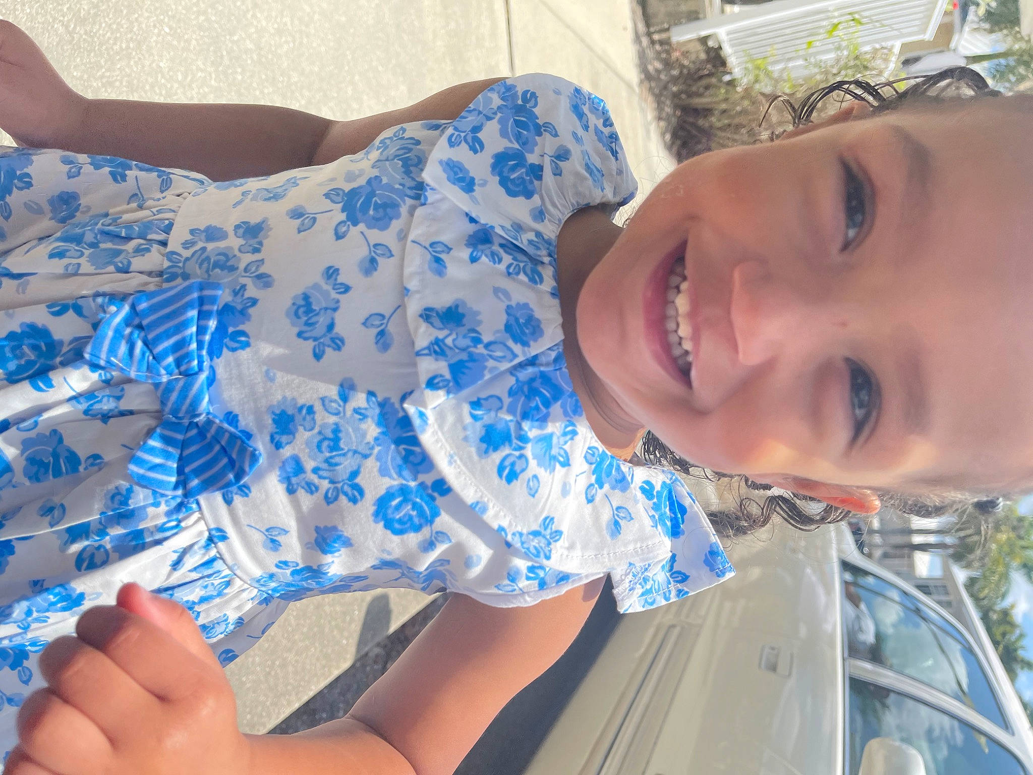 Julianny is registered to the contest to win money with this photo: azure, blue, child, cool, electric_blue, finger, fun, happy, hat, human_leg, joy, leisure, mouth, pattern, person, skin, smile, t_shirt, textile, thigh