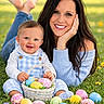 baby, woman, grass, easter_eggs, basket, smiling, outdoor, spring, flowers, blue_sweater, overalls, happy, portrait, nature, daylight, child, family, playful, colorful, greenery