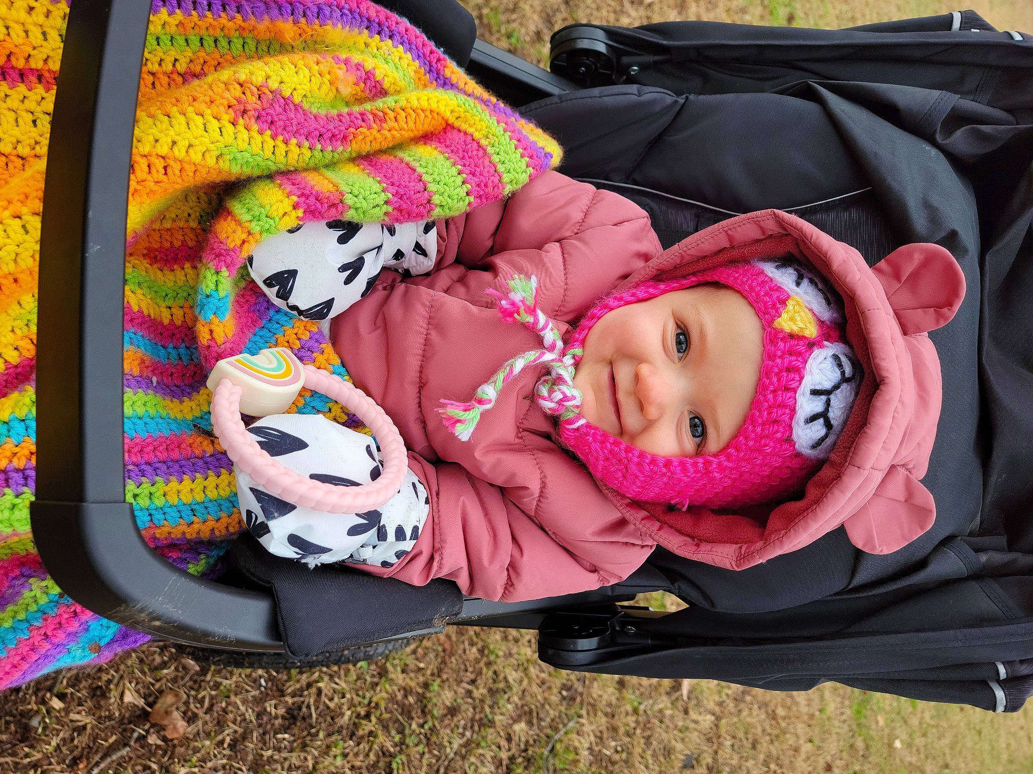 Isla joined the competition — help win amazing prizes! baby, baby_carriage, baby_products, baby_toddler_clothing, bag, car_seat, child, comfort, fashion_accessory, grass, headgear, headwear, joy, magenta, mammal, nap, pattern, person, pink, sitting