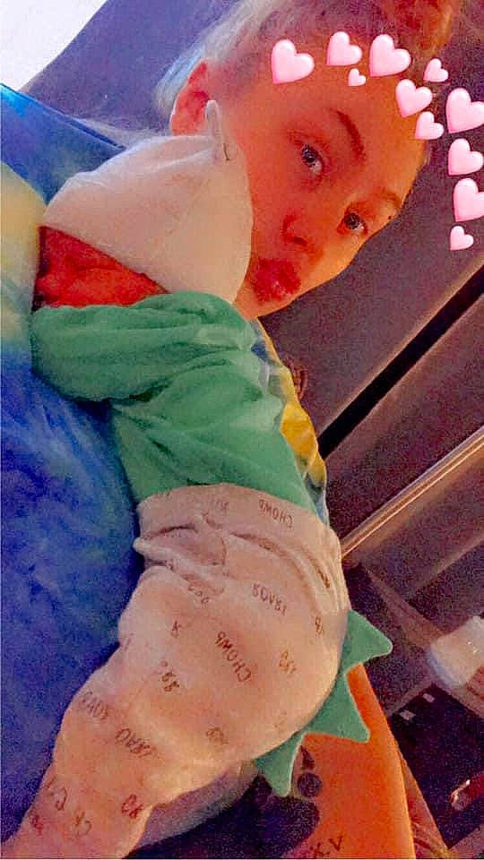 Kaysen is registered to the contest to win money with this photo: baby, baby_products, baby_toddler_clothing, beauty, child, comfort, happy, human_leg, leg, magenta, nose, orange, person, photograph, pink, skin, sleeve, snapshot, t_shirt, textile