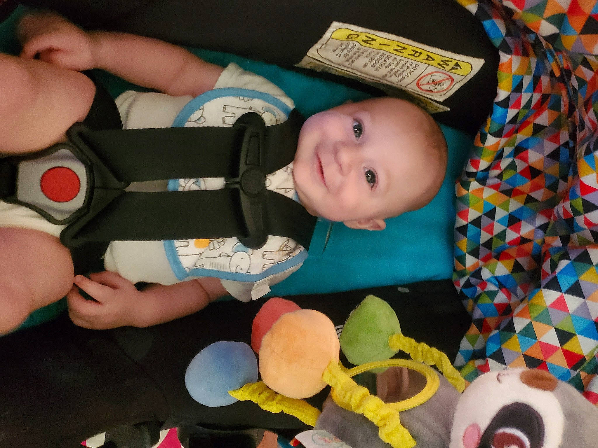 Atticus is registered to the contest to win money with this photo: baby, baby_products, baby_toddler_clothing, baby_toys, cheek, child, comfort, facial_expression, finger, fun, happy, hat, human_body, joy, person, plastic, play, room, smile, thumb
