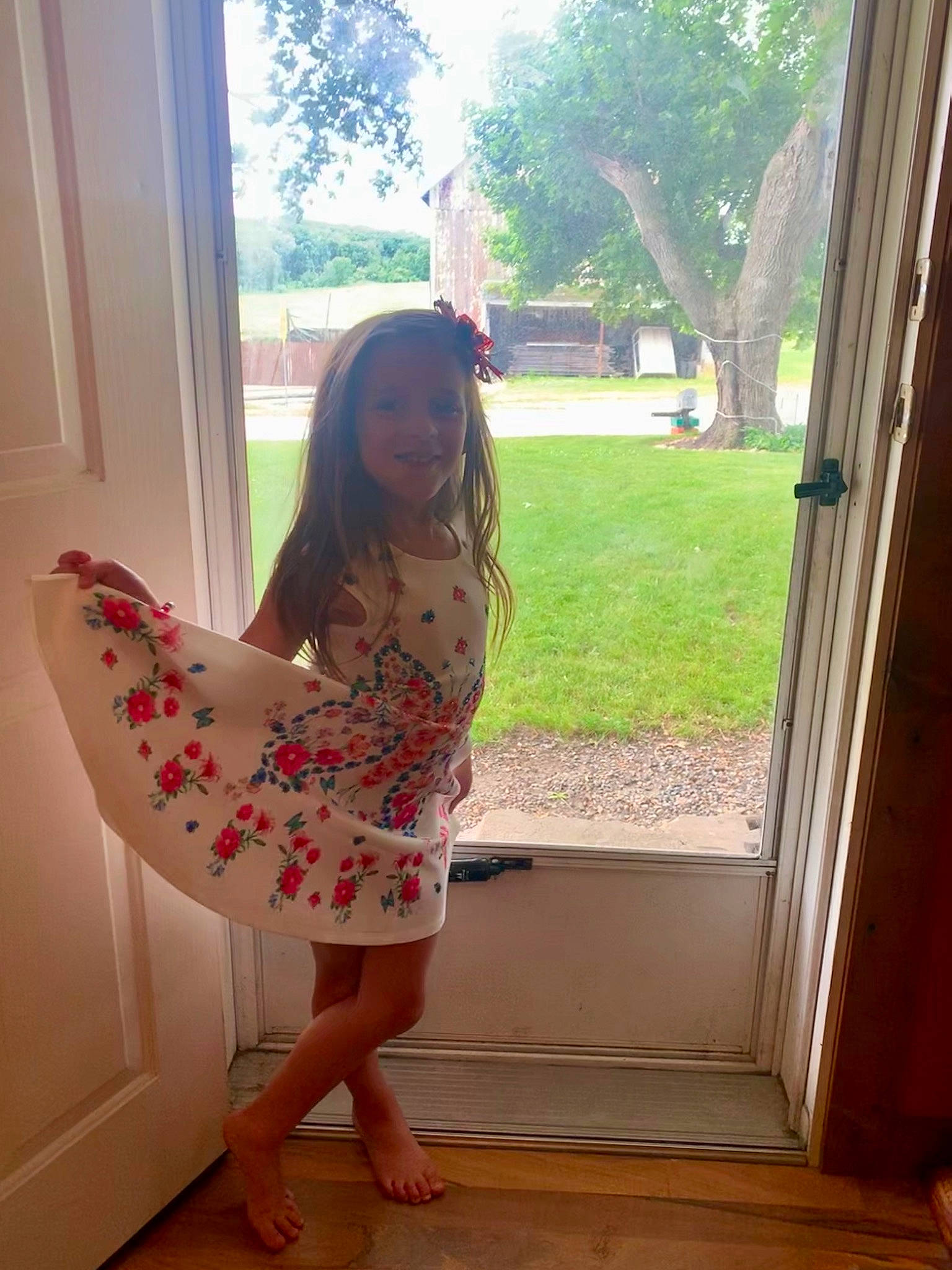 Gigi is registered to the contest to win money with this photo: dress, floor, interior_design, joy, long_hair, pattern, person, pink, polka_dot, room, summer, textile, window