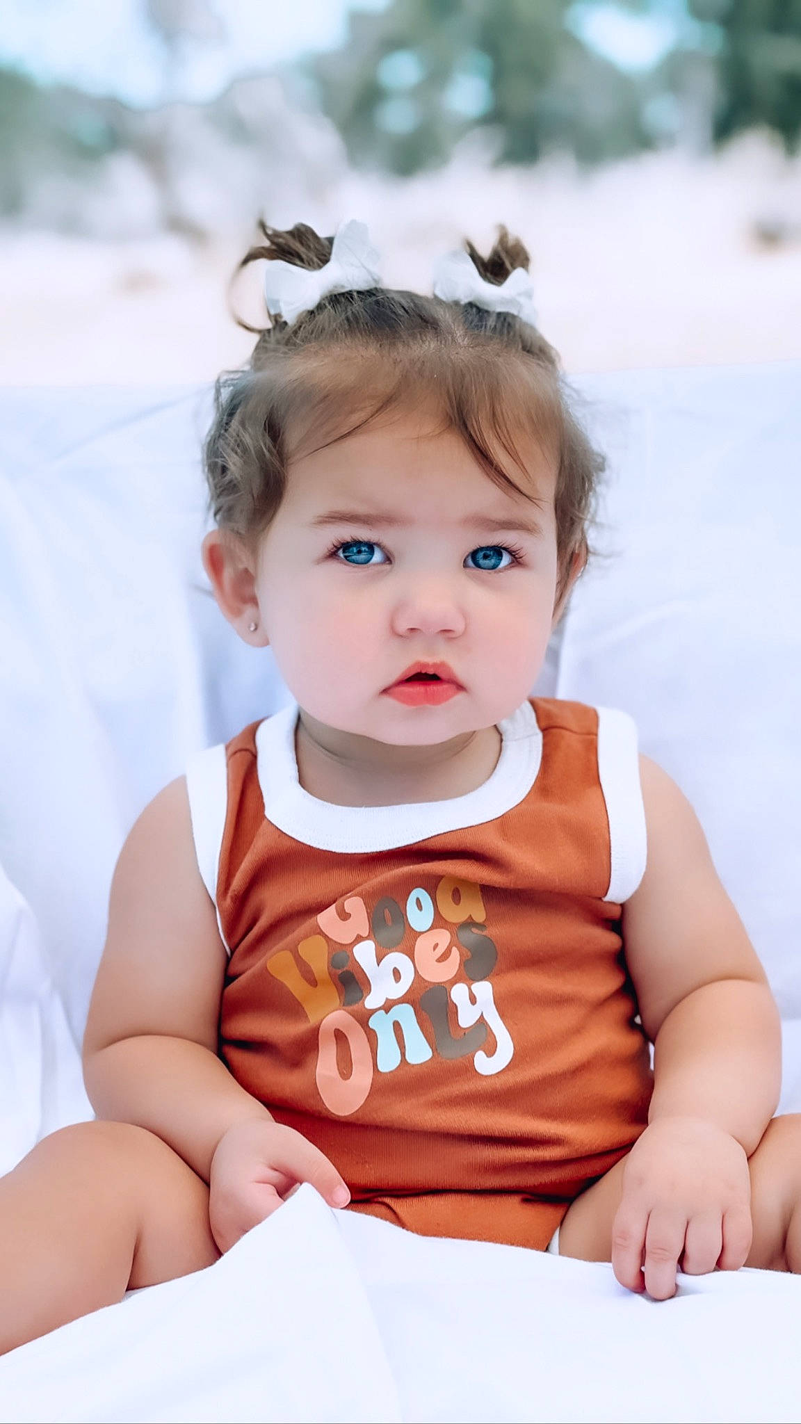 Lakelyn is registered to the contest to win money with this photo: arm, baby, baby_toddler_clothing, cheek, child, dress, eyelash, grass, hairstyle, happy, human_body, iris, lip, neck, person, skin, sleeve, summer, t_shirt, toddler