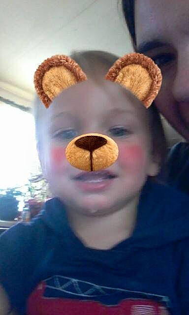 Justus is registered to the contest to win money with this photo: cheek, child, ear, face, fun, head, mouth, nose, person, plush, smile, snout, stuffed_toy, teddy_bear, textile, toy