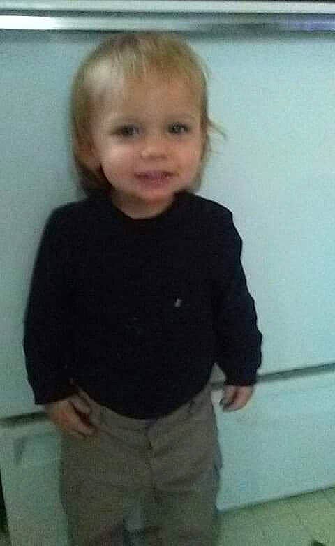 Justus is registered to the contest to win money with this photo: boy, cheek, child, chin, cool, day, eye, face, forehead, girl, hair, hairstyle, head, human_hair_color, mouth, person, product, smile, standing, toddler