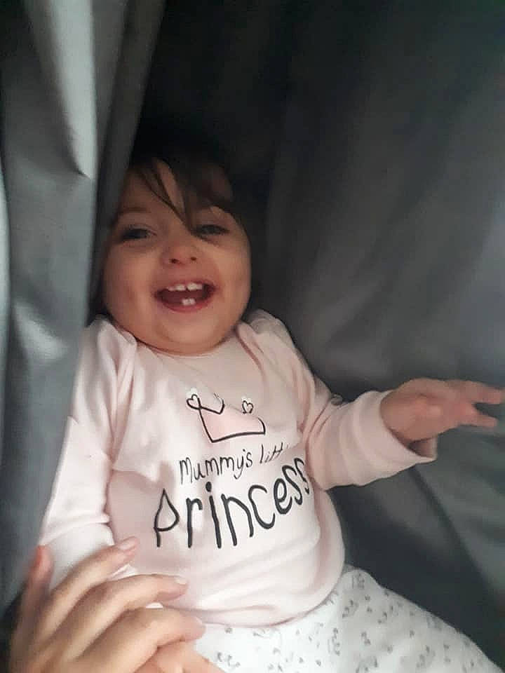 Paisley-jo is registered to the contest to win money with this photo: arm, cheek, child, chin, day, emotion, face, facial_expression, finger, forehead, hand, head, infant, joy, mouth, nose, person, product, skin, smile