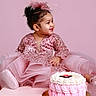 toddler, child, birthday, cake, pink_dress, headpiece, celebration, smile, portrait, happy, studio, fashion, party, cute, sitting, female, background, decorative_cake, pink_background, young