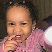 Giafripp joined the competition — help win amazing prizes! child, toddler, smiling, pink_pajamas, face, hand, hair_ties, indoors, cute, happy, portrait, person, playful, young_child, baby, skin, head, expression, people, cozy
