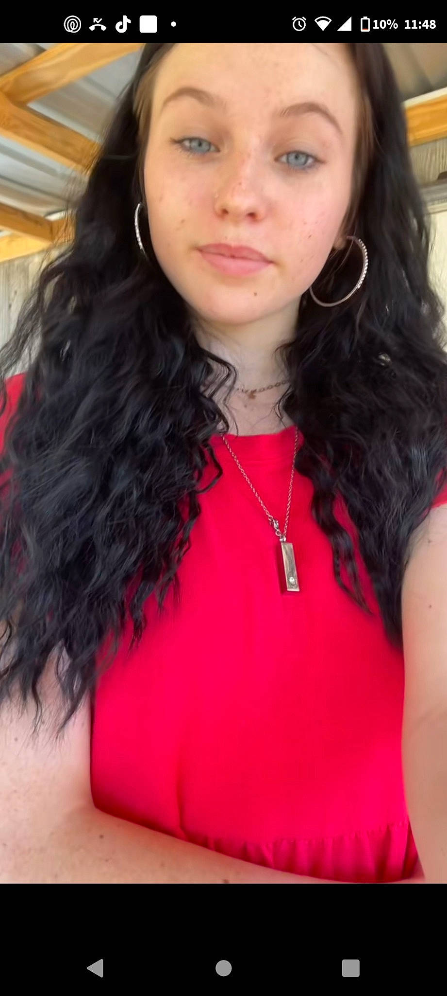 Bayle is registered to the contest to win money with this photo: bangs, black_hair, body_jewelry, dress, earrings, eyebrow, eyelash, eyewear, fashion_design, gesture, jaw, layered_hair, lip, lipstick, long_hair, neck, person, red, selfie, sleeve