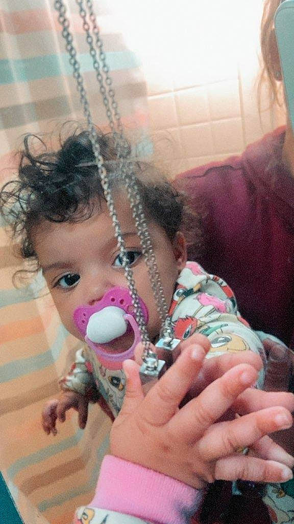 Journee is registered to the contest to win money with this photo: baby, baby_products, cheek, child, doll, eyelash, finger, fun, gesture, hand, happy, head, iris, nail, nose, person, pink, skin, stuffed_toy, thumb