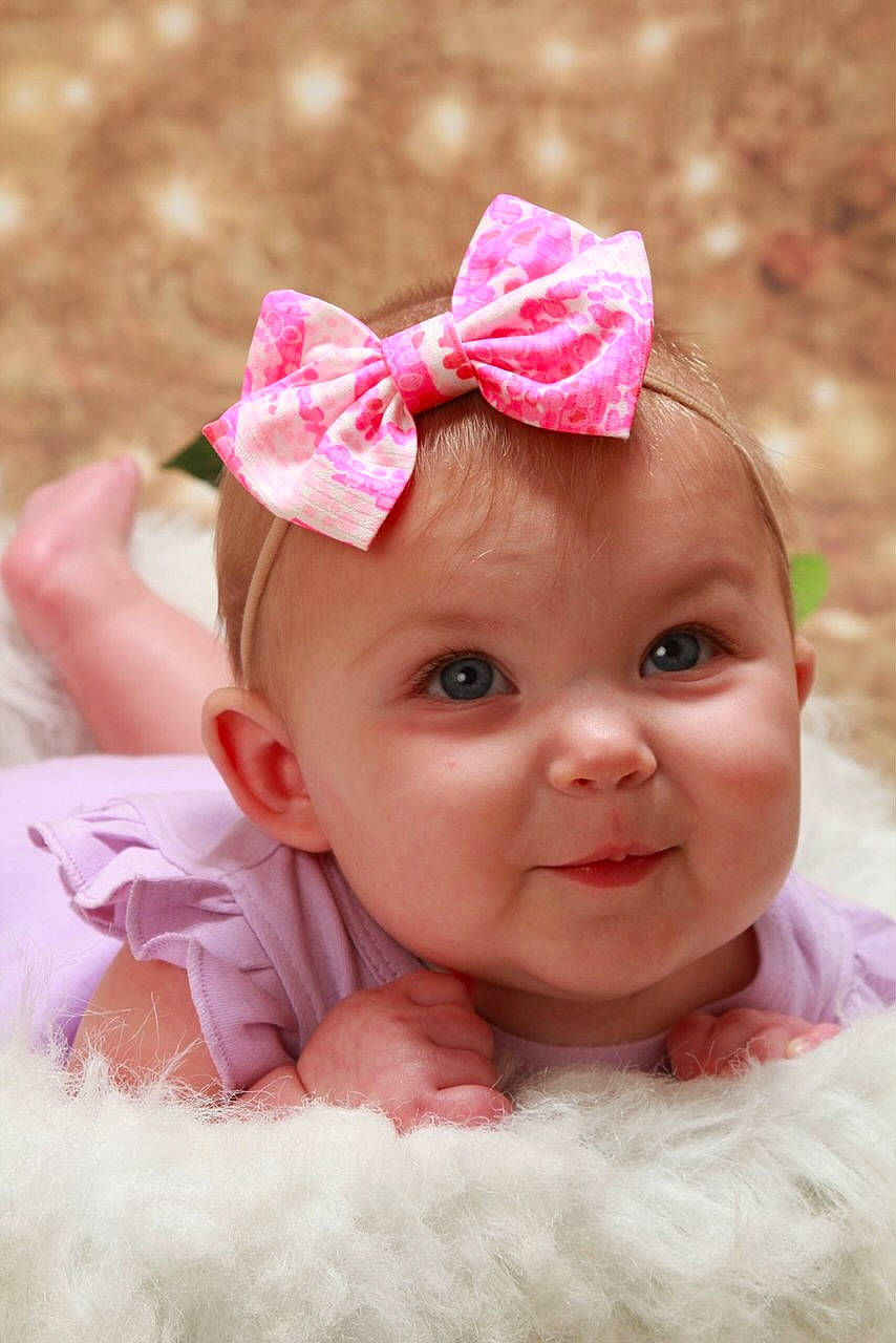 Mckinley joined the competition — help win amazing prizes! baby, baby_products, baby_toddler_clothing, cheek, child, clothing, costume_accessory, fashion_accessory, hair_accessory, head, headband, headgear, headpiece, person, photography, pink, product, skin, toddler