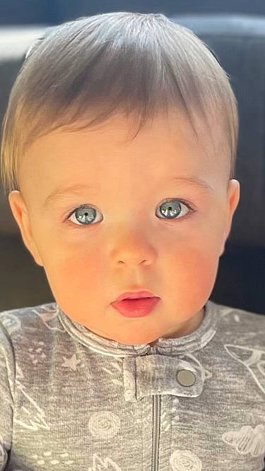 Collin is registered to the contest to win money with this photo: baby, blond, cheek, child, chin, ear, eyebrow, eyelash, forehead, human_body, iris, jaw, lip, mouth, no_expression, nose, organ, person, skin, sleeve