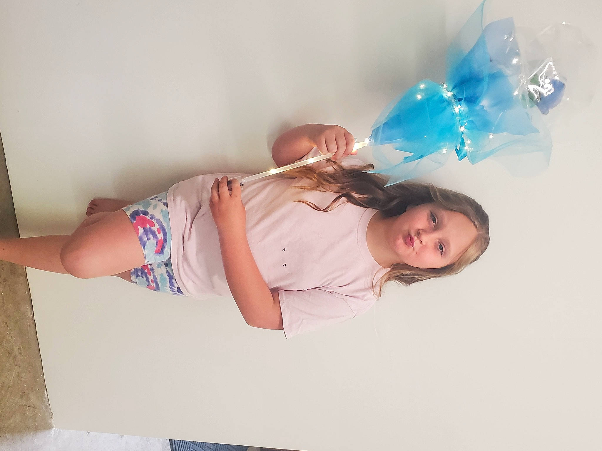 Brooklyn is registered to the contest to win money with this photo: abdomen, blond, comfort, elbow, electric_blue, eyewear, fashion_design, happy, human_leg, knee, long_hair, person, shoulder, sleeve, smile, stomach, t_shirt, thigh, trunk, waist