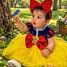 baby, child, infant, outdoor, park, garden, bird, blue_bird, snow_white_costume, dress, yellow_skirt, red_bow, headband, daisies, flowers, tree, sitting, portrait, smiling, sunlight