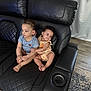 toddler, child, couch, leather, black, indoor, floor, carpet, person, cute, sitting, clothing, curtain, door, home, portrait, happy, cute_expression, furniture, two_children