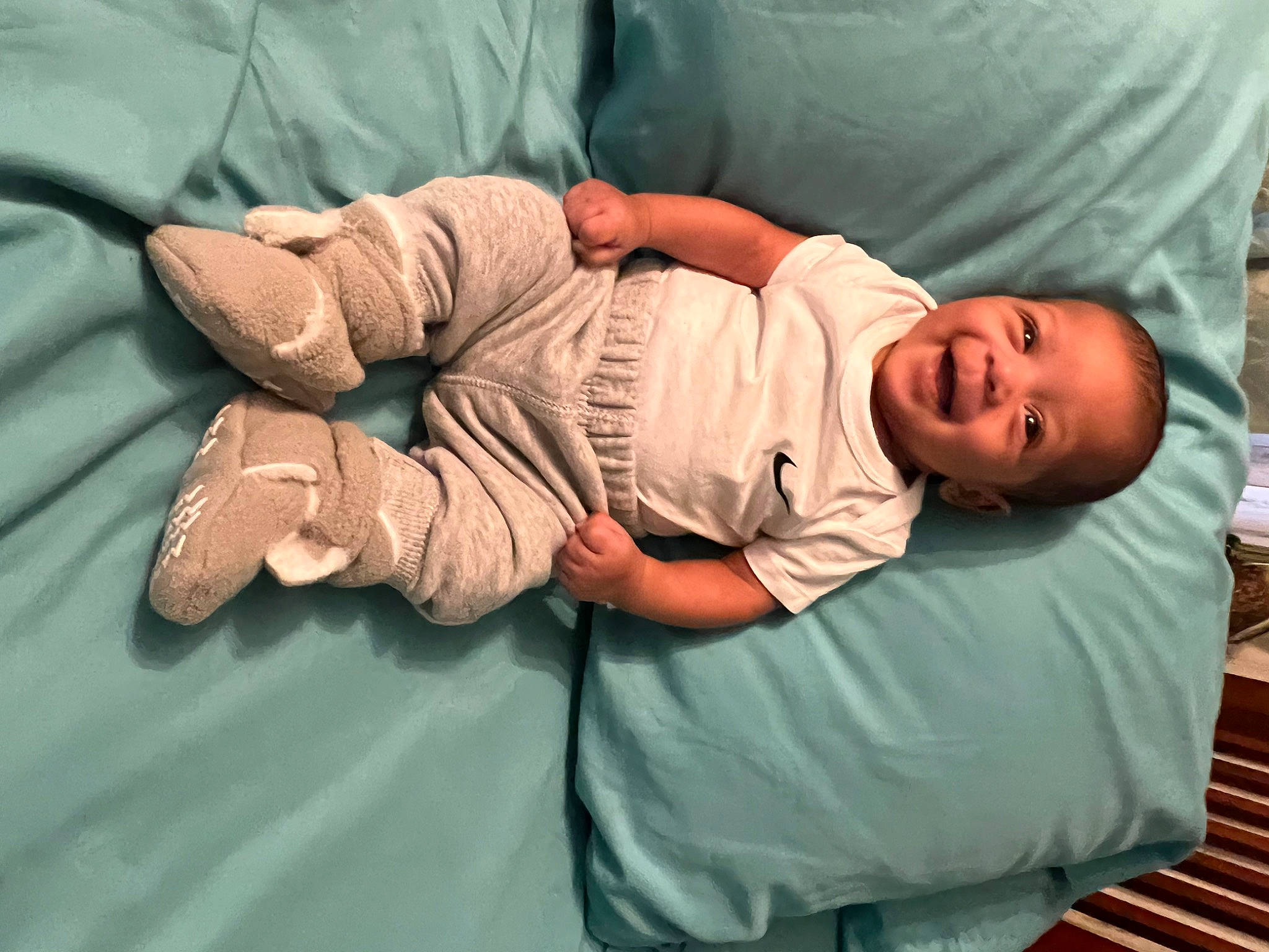 Zachariah is registered to the contest to win money with this photo: abdomen, baby, baby_products, baby_sleeping, baby_toddler_clothing, comfort, elbow, gesture, glasses, grass, hospital, human_body, joint, knee, linens, nap, person, service, sitting, sleeve
