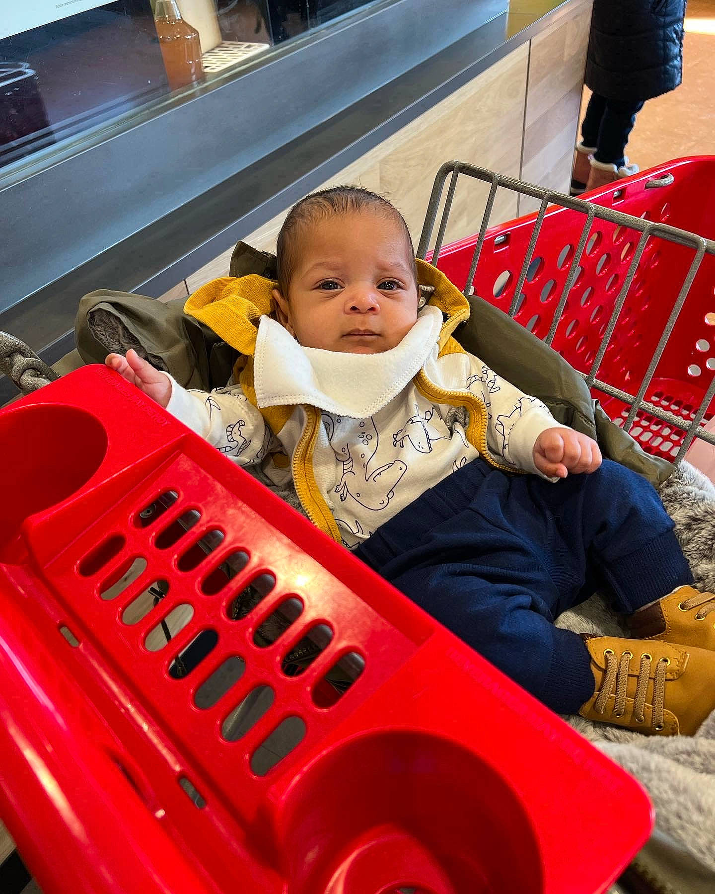 Zachariah is registered to the contest to win money with this photo: automotive_tire, baby, baby_toddler_clothing, child, chute, city, fun, green, leisure, motor_vehicle, person, photograph, product, recreation, riding_toy, sitting, snapshot, toddler, travel, vehicle