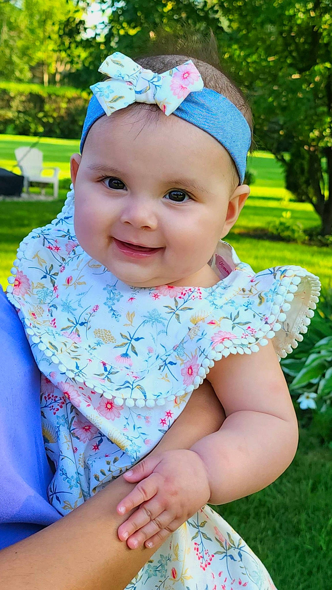 Natalia joined the competition — help win amazing prizes! baby_toddler_clothing, blue, cap, chin, eye, face, facial_expression, grass, green, happy, head, headgear, headwear, joy, lip, person, photograph, pink, plant, purple