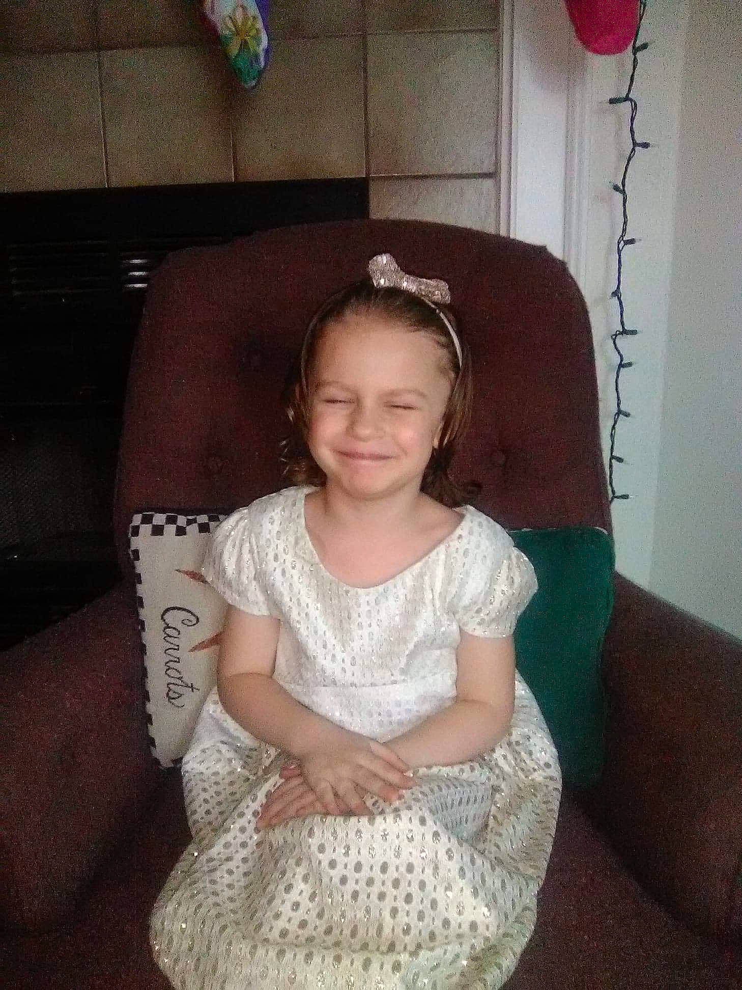 Erica is registered to the contest to win money with this photo: child, crochet, girl, hair, hair_accessory, hairstyle, human_hair_color, iris, jewellery, joy, person, product, shoulder, textile, toddler