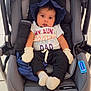 baby, stroller, infant, mittens, blue_bonnet, white_socks, black_pants, colorful_shirt, face, child, tiled_floor, wheels, car_seat, cute, seated, indoors, expression, clothing, person, portrait