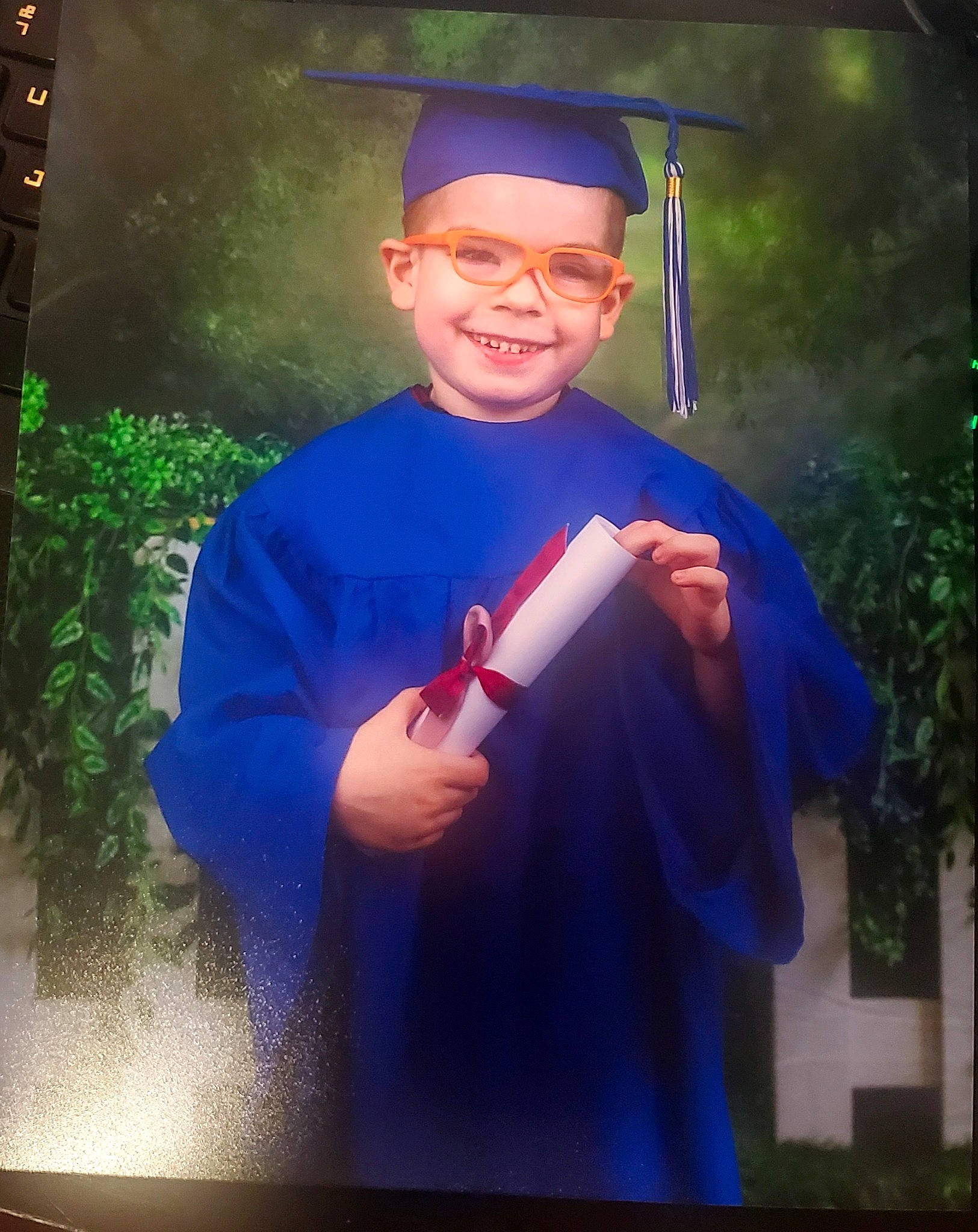 Ronin joined the competition — help win amazing prizes! academic_dress, academic_institution, electric_blue, event, eyewear, formal_wear, fun, gesture, glasses, graduation, happy, hat, headgear, headwear, joy, mortarboard, outerwear, person, phd, plant