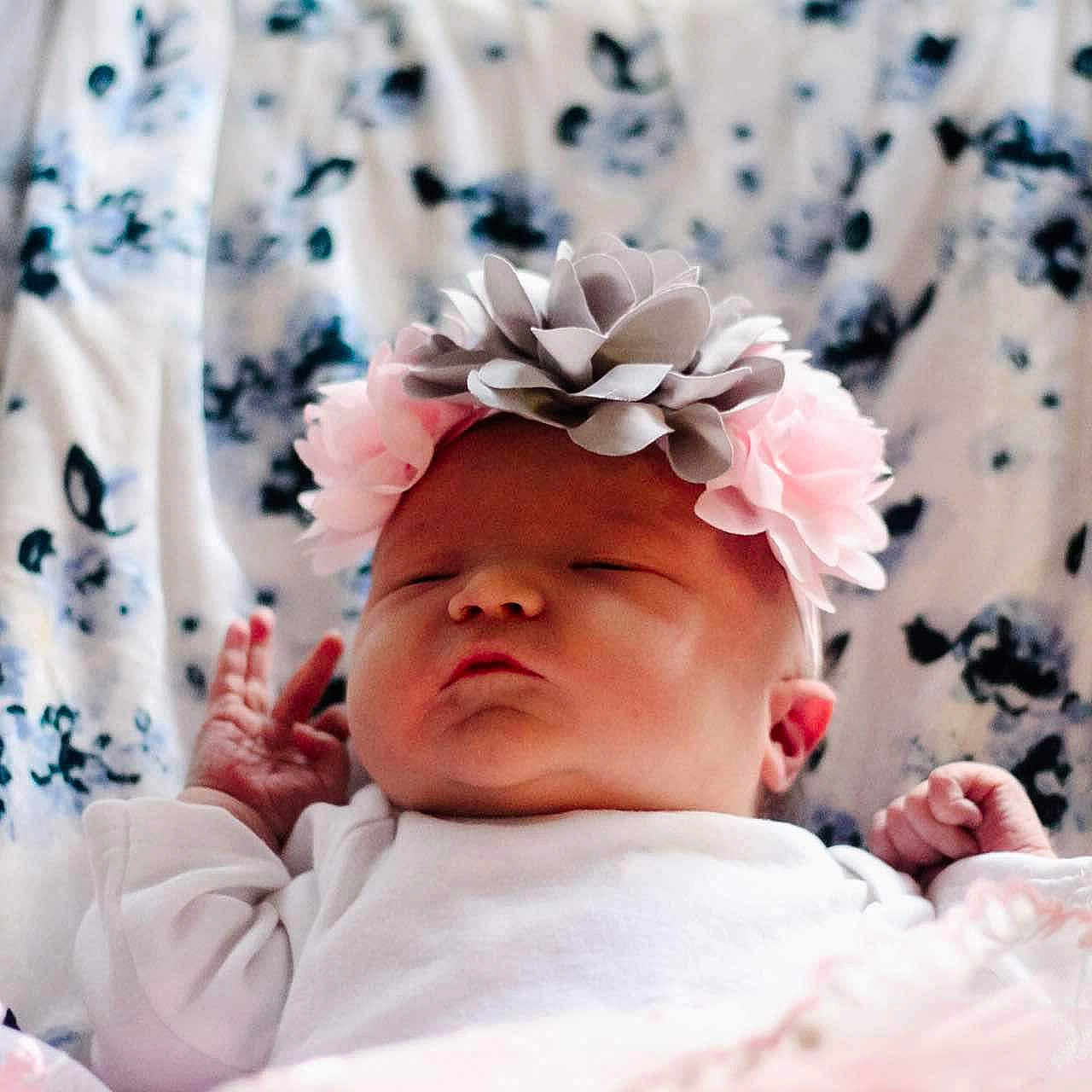 Avianna joined the competition — help win amazing prizes! architecture, baby, bed, bedroom, building, clothing, crib, face, furniture, hat, head, hospital, indoors, infantbed, newborn, person, photography, portrait, room, sleeping