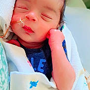 Montrond joined the competition — help win amazing prizes! newborn, baby, sleeping, blanket, infant, feeding_tube, face, hand, wrapped, cute, peaceful, indoors, person, skin, head, rest, closeup, healthcare, soft, toddler