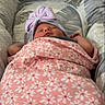newborn, baby, infant, sleeping, swaddled, blanket, floral_blanket, bow, headband, pink, cushion, chair, portrait, indoors, cozy, resting, face, closed_eyes, photography, child