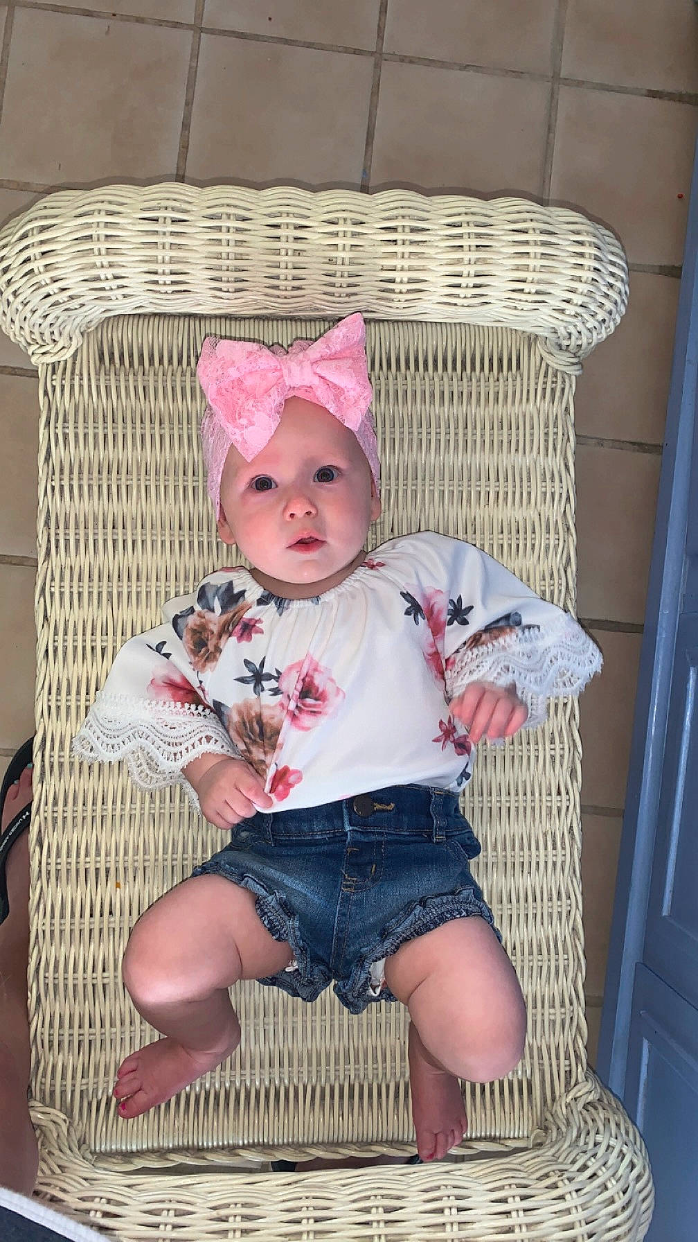 Zaelyn joined the competition — help win amazing prizes! baby, baby_products, baby_toddler_clothing, chair, child, clothing, comfort, fashion_accessory, foot, headwear, linens, magenta, pattern, person, pink, shorts, sitting, sleeve, sock, textile