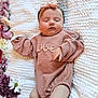 Elizabeth is registered to the contest to win money with this photo: baby, sleeping, onesie, pink, headband, flower, blanket, infant, peaceful, soft, cute, child, portrait, resting, cozy, newborn, hands, legs, indoor, closeup