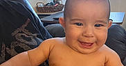Julian joined the competition — help win amazing prizes! adult, baby, basket, casual, child, clothing, couch, diaper, face, furniture, hand, happy, home, indoor, light, person, seated, skin, smile, window