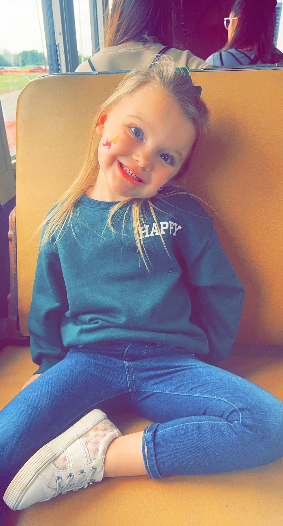 Amaris is registered to the contest to win money with this photo: blue, chair, clothing, comfort, cool, eye, facial_expression, flash_photography, hair, hairstyle, happy, head, joint, joy, knee, neck, person, shoulder, skin, smile